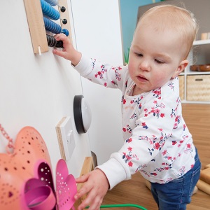 toddler at play wall